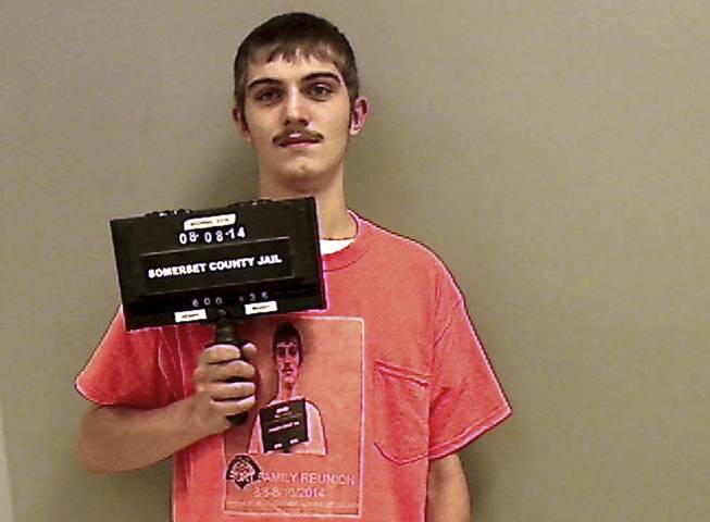 This Friday, Aug. 8, 2014, booking photo released by the Somerset County Sheriff’s Department shows Bobby Burt of Pittsfield, Maine, as he reported to serve jail time in Madison, Maine, for a June arrest for operating under the influence while driving. Burt arrived wearing a T-shirt bearing his mug shot that was made at the time of the June arrest.