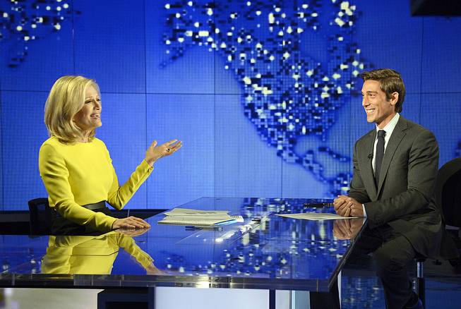 Diane Sawyer signs off on her last broadcast as anchor of "World News" in New York on Wednesday, Aug. 27, 2014. Sawyer told viewers that it has been wonderful to be the "home port" of the network's news team each weeknight. David Muir, right, will become anchor and managing editor of the program in September.