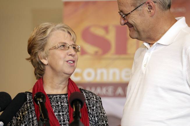 Nancy Writebol, who spent weeks in isolation after contracting the deadly Ebola virus in Liberia, looks to her husband, David, during a news conference Wednesday, Sept. 3, 2014 in Charlotte, N.C. This is the first time that the Charlotte woman, who was recently released from an Atlanta hospital, has spoken publicly about her experience. She and her husband, both missionaries, had been in Liberia for a year working in a clinic when she contracted the disease.