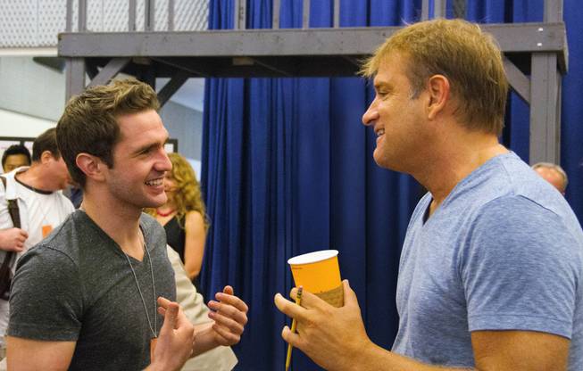 This photo provided by Disney Theatrical Productions shows actor, Dan DeLuca, left, and director, Jeff Calhoun, during rehearsals for "Newsies" at New 42nd Street Studios on Wednesday, Sept. 3, 2014, in New York. The North American company of the Broadway hit “Newsies” is about to high-kick its way through a 25-city tour and its being led by the 22-year-old actor who’ll make a triumphant homecoming in Pittsburgh in time for Thanksgiving.