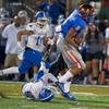 Gaels tight end Alize Jones (8) evades a Bingham Utah High tackler during the fourth quarter at Fertitta Field on Friday night. Gaels tight end Alize Jones (8) evades a Bingham Utah High tackler during the fourth quarter at Fertitta Field on Friday night.