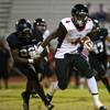 Photo: Las Vegas running back Elias Miller (4) evades a t Photo: Las Vegas running back Elias Miller (4) evades a t