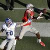 UNLV wide receiver Devante Davis (81) catches a pass over Air Force defensive back Gavin McHenry (20) during the second half of an NCAA college football game Saturday, Nov. 8, 2014, in Las Vegas. Air Force won 48-21. (AP Photo/John Locher) UNLV wide receiver Devante Davis (81) catches a pass over Air Force defensive back Gavin McHenry (20) during the second half of an NCAA college football game Saturday, Nov. 8, 2014, in Las Vegas. Air Force won 48-21. (AP Photo/John Locher)