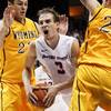 Boise State's Anthony Drmic (center) moves the ball between Wyoming's Larry Nance Jr. and Nathan Sobey during the second half in Boise, Idaho, on Saturday, Jan. 11, 2014. Wyoming defeated Boise State 52-50. Boise State's Anthony Drmic (center) moves the ball between Wyoming's Larry Nance Jr. and Nathan Sobey during the second half in Boise, Idaho, on Saturday, Jan. 11, 2014. Wyoming defeated Boise State 52-50.