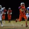 Liberty's Spencer Wilson #8 breaks free on a long touchdown run over Basic at the Sunrise Regional championship game on Friday, November 21, 2014. Liberty's Spencer Wilson #8 breaks free on a long touchdown run over Basic at the Sunrise Regional championship game on Friday, November 21, 2014.