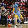 San Diego State forward Dwayne Polee II chases a loose ball as he is fouled by Cal State Bakersfield guard Brent Wrapp during the first half on Thursday, Nov. 20, 2014, in San Diego. San Diego State forward Dwayne Polee II chases a loose ball as he is fouled by Cal State Bakersfield guard Brent Wrapp during the first half on Thursday, Nov. 20, 2014, in San Diego.