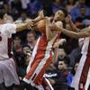 UNLV's Christian Wood, center, fights Stanford defenders for a rebound in the Coaches vs. Cancer Classic in New York, Friday, Nov. 21, 2014. Stanford defeated UNLV 89-60. UNLV's Christian Wood, center, fights Stanford defenders for a rebound in the Coaches vs. Cancer Classic in New York, Friday, Nov. 21, 2014. Stanford defeated UNLV 89-60.