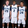 Centennial High basketball players, from left, Garett Scheer, Troy Brown and Darrian Traylor. Centennial High basketball players, from left, Garett Scheer, Troy Brown and Darrian Traylor.
