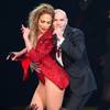 Jennifer Lopez is embraced by Pitbull at the end of her performance during the 42nd Annual American Music Awards at Nokia Theater L.A. Live on Sunday, Nov. 23, 2014, in Los Angeles. Jennifer Lopez is embraced by Pitbull at the end of her performance during the 42nd Annual American Music Awards at Nokia Theater L.A. Live on Sunday, Nov. 23, 2014, in Los Angeles.