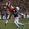 UNLV's Devante Davis makes a touchdown catch over UNR's Evan Favors during the first half at Sam Boyd Stadium on Saturday, Nov. 29, 2014. UNLV's Devante Davis makes a touchdown catch over UNR's Evan Favors during the first half at Sam Boyd Stadium on Saturday, Nov. 29, 2014.
