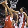 UNLV forward Christian Wood, right, deflects a shot under the basket from Utah forward Chris Reyes at the MGM Grand Garden Arena on Saturday, Dec. 20, 2014. UNLV forward Christian Wood, right, deflects a shot under the basket from Utah forward Chris Reyes at the MGM Grand Garden Arena on Saturday, Dec. 20, 2014.