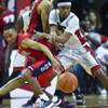 Arizona guard Parker Jackson-Cartwright (0) and UNLV guard Patrick McCaw (2) look to a loose ball at the Thomas & Mack Center on Tuesday, December 23, 2014. . Arizona guard Parker Jackson-Cartwright (0) and UNLV guard Patrick McCaw (2) look to a loose ball at the Thomas & Mack Center on Tuesday, December 23, 2014. .