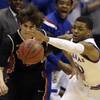 Kansas guard Frank Mason III steals the ball from UNLV guard Cody Doolin during the first half of a college basketball game in Lawrence, Kan., on Sunday, Jan. 4, 2015. Kansas guard Frank Mason III steals the ball from UNLV guard Cody Doolin during the first half of a college basketball game in Lawrence, Kan., on Sunday, Jan. 4, 2015.