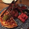 Fried chicken, cheddar waffles and cubed watermelon at Yardbird in the Venetian. Fried chicken, cheddar waffles and cubed watermelon at Yardbird in the Venetian.