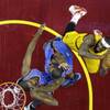 Photo: Cleveland Cavaliers' LeBron James, right, shoots o Photo: Cleveland Cavaliers' LeBron James, right, shoots o
