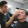 Kazu Tsuji works on the makeup for Bob Anderson, who plays Frank Sinatra in “Frank: The Man, The Music,” at Palazzo on Friday, Jan. 23, 2015, in Las Vegas.