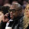 Photo: Boxer Floyd Mayweather Jr. talks on the phone whil Photo: Boxer Floyd Mayweather Jr. talks on the phone whil