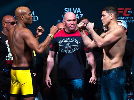 Middleweight fighters Anderson Silva and Nick Diaz face off following their UFC183 fighter weigh ins at the MGM Grand Garden Arena on Friday, January 30, 2015.
