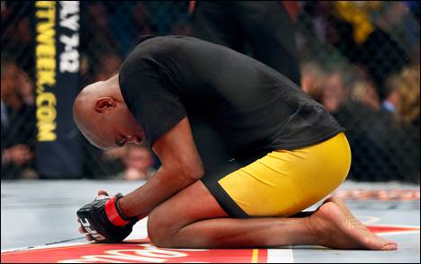 Middleweight Anderson Silva takes a private moment on the canvass after beating Nick Diaz in their fight at the MGM Grand Garden Arena on Saturday, January 31, 2015. L.E. Baskow