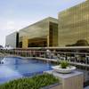 Guests enjoy swimming in a pool at the newly-opened City of Dreams Manila casino Monday, Feb. 2, 2015 at the reclaimed prime property in Manila, Philippines. Guests enjoy swimming in a pool at the newly-opened City of Dreams Manila casino Monday, Feb. 2, 2015 at the reclaimed prime property in Manila, Philippines.