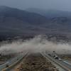 Photo: Authorities and motorists battle the elements as t Photo: Authorities and motorists battle the elements as t