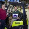 Doug Stout, left, operations manager, Adrian Paris, center, parts manager, and Tim Dixon, sales manager pose on the Inland/Hobbs Material Handling shop floor in Las Vegas Monday, Feb. 9, 2015. Their boss Rick Kwiatkowski, pictured on the laptop, lives in Phoenix. Doug Stout, left, operations manager, Adrian Paris, center, parts manager, and Tim Dixon, sales manager pose on the Inland/Hobbs Material Handling shop floor in Las Vegas Monday, Feb. 9, 2015. Their boss Rick Kwiatkowski, pictured on the laptop, lives in Phoenix.