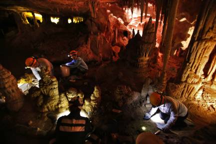 Volunteers clean lint off rock formations inside the Lehman Cave at the Great Basin National Park in Baker, Nev. Over a three-day period last month, volunteers from California, Nevada and Utah participated in “lint camp,” helping to wipe, clean and clear dust, and pick lint that has gathered on rock formations within the cave.