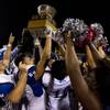 Photo: Basic players celebrate their Henderson Bowl victo Photo: Basic players celebrate their Henderson Bowl victo