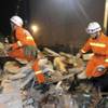 Photo: In this Friday, Oct. 30, 2015 photo, rescuers sear Photo: In this Friday, Oct. 30, 2015 photo, rescuers sear