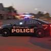 Photo: A police car drives into the Springlake Police Sta Photo: A police car drives into the Springlake Police Sta
