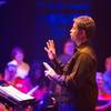 Photo: Keith Thompson conducts the orchestra during God L Photo: Keith Thompson conducts the orchestra during God L