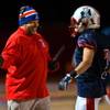 Photo: Liberty's head coach Richard Muraco congratulates Photo: Liberty's head coach Richard Muraco congratulates