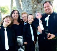 The Robison family poses for photos in August shortly after Gabe returned home from Texas. Gabe, then 14, is on the far left next to his mother, Jaleadeanne Robison.