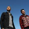 Photo: John Legend and Juanes arrive to perform in front Photo: John Legend and Juanes arrive to perform in front