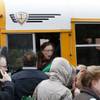 Photo: A school bus driver yells to a parent that their c Photo: A school bus driver yells to a parent that their c