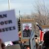 Photo: A sign is displayed with the picture of LaVoy Fini Photo: A sign is displayed with the picture of LaVoy Fini