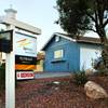 Photo: This February photo shows a house for sale in the Photo: This February photo shows a house for sale in the