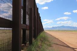 This Wednesday, Sept. 16, 2015, photo shows a part of the border fence near Naco, Ariz., during a tour of the border hosted by the Cochise County Sheriff's Office.