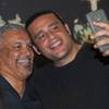 UNLV Runnin Rebels head coach Marvin Menzies takes a selfie photo with a fan during the Coaches vs. Cancer fundraising event at Born and Raised on Wednesday evening. UNLV Runnin Rebels head coach Marvin Menzies takes a selfie photo with a fan during the Coaches vs. Cancer fundraising event at Born and Raised on Wednesday evening.