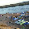 Photo: A sea of garbage was left behind some of the 30,00 Photo: A sea of garbage was left behind some of the 30,00