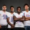 Photo: Members of the Western High football team pose for Photo: Members of the Western High football team pose for