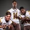 Photo: Members of the Bonanza High football team pose for Photo: Members of the Bonanza High football team pose for