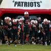 Photo: The Liberty football team enter the field through Photo: The Liberty football team enter the field through