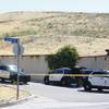 Los Angeles police patrol the entrance to the street of singer Chris Brown's home in the Tarzana neighborhood of Los Angeles on Tuesday. Los Angeles police patrol the entrance to the street of singer Chris Brown's home in the Tarzana neighborhood of Los Angeles on Tuesday.