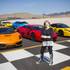 SPEEDVEGAS. Vice President of Business Allison Raskansky poses for a photo with a selection of cars available to race at their 1.5 mile long racetrack, Thursday, June 2, 2016. SPEEDVEGAS. Vice President of Business Allison Raskansky poses for a photo with a selection of cars available to race at their 1.5 mile long racetrack, Thursday, June 2, 2016.