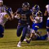 Photo: Legacy's Sam Turner (22) blasts through the Moapa Photo: Legacy's Sam Turner (22) blasts through the Moapa