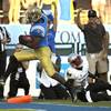 UCLA running back Soso Jamabo, left, scores a touchdown as UNLV defensive back Darius Mouton misses the tackle during the first half of a college football game, Saturday, Sept. 10, 2016, in Pasadena, Calif. UCLA running back Soso Jamabo, left, scores a touchdown as UNLV defensive back Darius Mouton misses the tackle during the first half of a college football game, Saturday, Sept. 10, 2016, in Pasadena, Calif.
