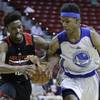 Golden State Warriors' Patrick McCaw, right, and Houston Rockets' Isaiah Taylor battle for the ball during the second half of an NBA summer league basketball game, Wednesday, July 13, 2016, in Las Vegas. Golden State Warriors' Patrick McCaw, right, and Houston Rockets' Isaiah Taylor battle for the ball during the second half of an NBA summer league basketball game, Wednesday, July 13, 2016, in Las Vegas.