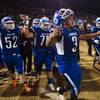 Photo: Basic QB Aaron Mcallister leads his team onto the Photo: Basic QB Aaron Mcallister leads his team onto the