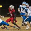 Liberty's Allan Mwata (22) cuts back on Basic defenders after an interception during the Sunrise regional high school football championship game on Friday, Nov. 18, 2016. Liberty's Allan Mwata (22) cuts back on Basic defenders after an interception during the Sunrise regional high school football championship game on Friday, Nov. 18, 2016.